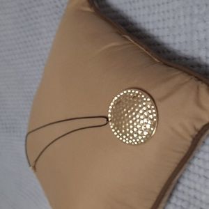 Statement hammered circle necklace.